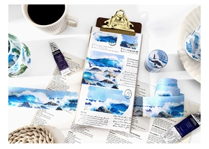 Macro detail of ocean wave themed washi tape with coastal patterns for scrapbooking