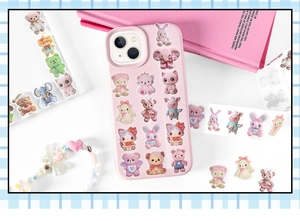 Close-up of pink iPhone case with cute cartoon animal stickers and plush texture detail
