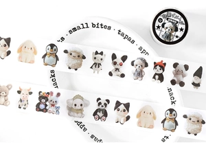 Detail of cartoon washi tape featuring plush animals like pandas and rabbits for DIY journaling