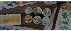 Artistic layout of six decorative ocean themed washi tape rolls for DIY scrapbooking