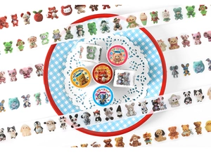Close-up of vintage animal-themed washi tape rolls featuring cute teddy bears and foxes