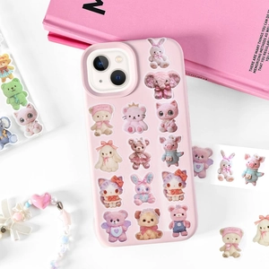 Cute pink iPhone case featuring cartoon plush doll patterns with matching pearl heart strap