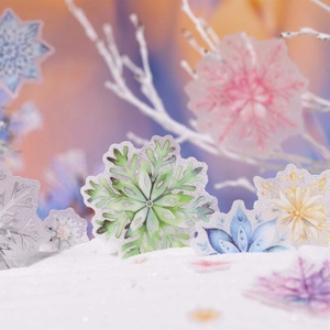 Sparkly snowflake glitter stickers in multiple colors for DIY winter journals and decor