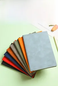 Close-up of A5 soft leather notebooks in eight colors for business office use