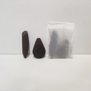 Deep brown makeup sponge set with slanted and teardrop shapes in a frosted pouch