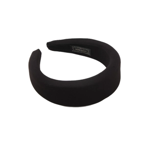 Chic black padded milk silk sponge headband for women with a handmade woven label