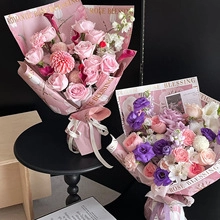 Detail of floral bouquet wrapped in pearlescent tissue paper with Rose Blessing print