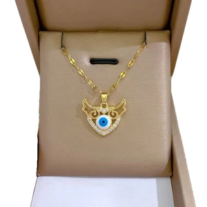 Luxurious gold-plated evil eye necklace with winged heart pendant and crystal accents