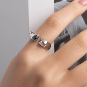 Minimalist silver irregular lava texture open ring featuring a polished mirror finish