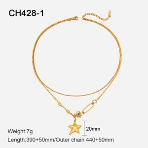 Detailed close-up of 14K gold double-layered star and sun pendant stainless steel necklace