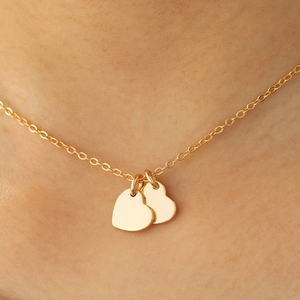 Chic gold double heart pendant necklace in polished stainless steel for women