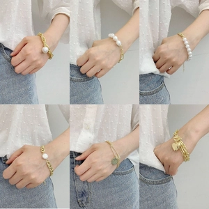 Baroque irregular pearl bracelet set with vintage gold heart and coin charms in multi-layers