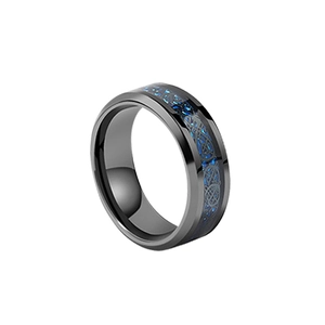 Close-up of black brushed stainless steel ring with blue carbon fiber and dragon inlay