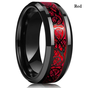 Close-up of black stainless steel ring with red dragon pattern and polished finish