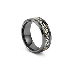 Mens stainless steel ring featuring a black finish with golden Celtic dragon pattern