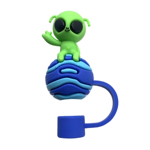 Detail of 10mm silicone straw topper with green alien on blue striped planet