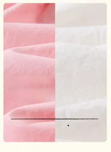 Detailed view of breathable 100% cotton plain weave fabric in soft pink and white colors