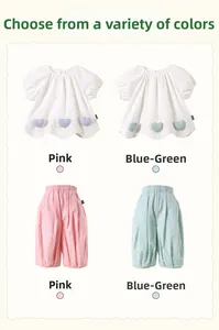Detail view of girls sweet heart shirts and bloomer shorts set in pink and teal