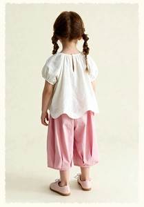 Detail view of girls sweet heart blouse back slit and pink wide-leg pants summer set