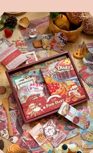 Detailed view of the vintage Food Diary stationery gift box with layered stickers and paper