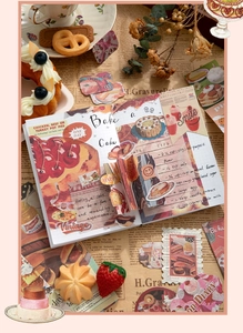 Detail showing vintage American bakery themed scrapbook stickers with artistic cake patterns