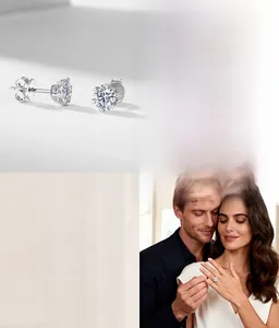 Detailed view of six-prong lab-grown diamond stud earrings and ring set in 18K white gold