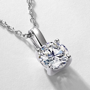 Classic four-prong solitaire necklace with brilliant round-cut diamond on S925 silver chain