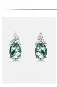 Detailed macro view of S925 silver oval moss agate earrings with leaf motif and zircon