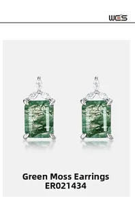 Macro view of rectangular green moss agate stud earrings with marquise zircon accents