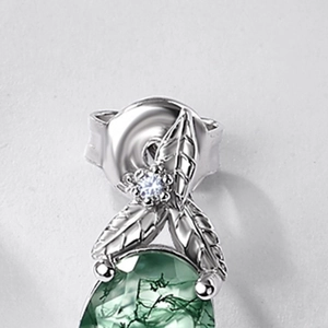 Elegant S925 silver stud earrings featuring oval green moss agate stones in leaf setting