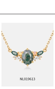 Macro shot of S925 gold plated necklace with moss agate and opal stones