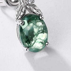 Oval moss agate earring in S925 silver with leaf design and small sparkling diamond