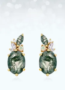 Detailed view of moss agate earrings with gold plating and leaf-shaped zircon accents