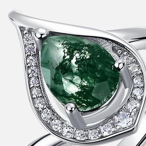 Elegant pear cut moss agate ring with sterling silver pave setting and halo accents