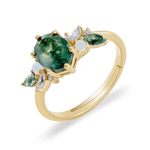 Adjustable gold ring with oval moss agate stone and opal accents on white background
