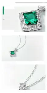 Détails macro du collier émeraude avec monture en argent S925 et pendentif floral