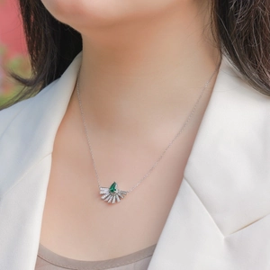 Elegant S925 silver gold necklace with emerald-green fan-shaped pendant on model