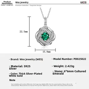Detail of S925 silver pendant with 6x6mm lab emerald and twisted diamond pavé design