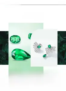 Detail view of pear-cut emerald earrings with cubic zirconia halo in S925 sterling silver