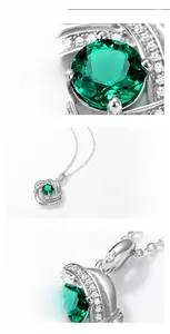 Macro shot of lab-grown emerald pendant featuring intricate S925 silver wire wrapping