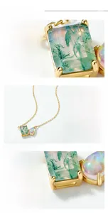 Detail of S925 gilded necklace featuring rectangular moss agate and oval opal gemstone
