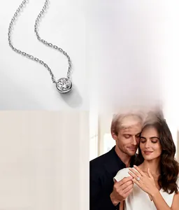 Detailed view of cultivated diamond bubble necklace and six-prong ring on a model