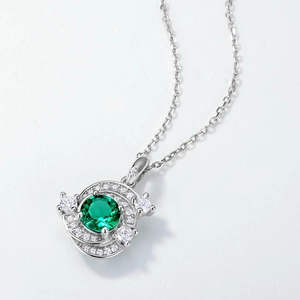Elegant S925 sterling silver necklace featuring a round emerald pendant with zircon halo
