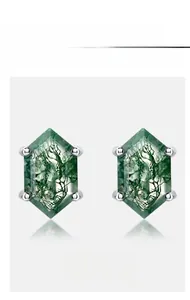 Macro view of hexagonal green moss agate earrings in silver four-prong setting