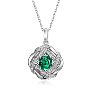 Luxurious S925 silver necklace featuring a swirling design with a green emerald gemstone