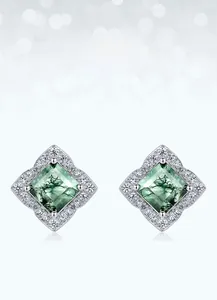 Macro shot of S925 silver square moss agate stud earrings with halo zirconia details