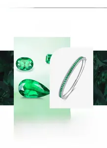 Macro detail of S925 silver bracelet featuring square-cut emeralds and side white zircons