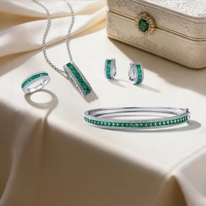 Luxury S925 silver jewelry set with princess cut emerald stones and pavé diamonds