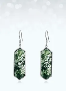 Macro shot of geometric moss agate earrings with natural green textures in S925 silver