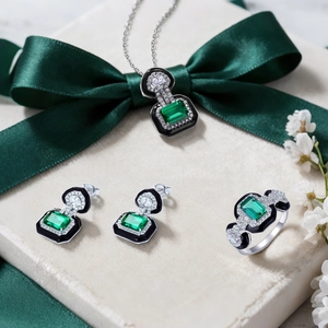 Vintage S925 silver jewelry set featuring emerald cut green stones and zircon accents
